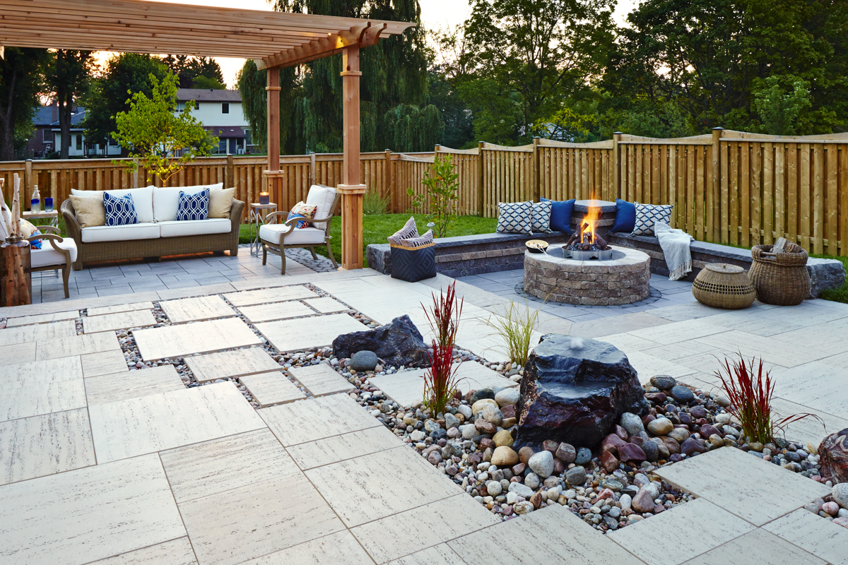 Patio with firepit and pergola and patio furniture