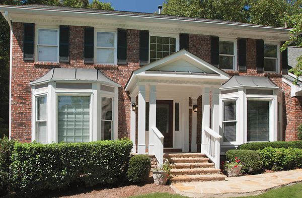 Portico over front door with gabled roof